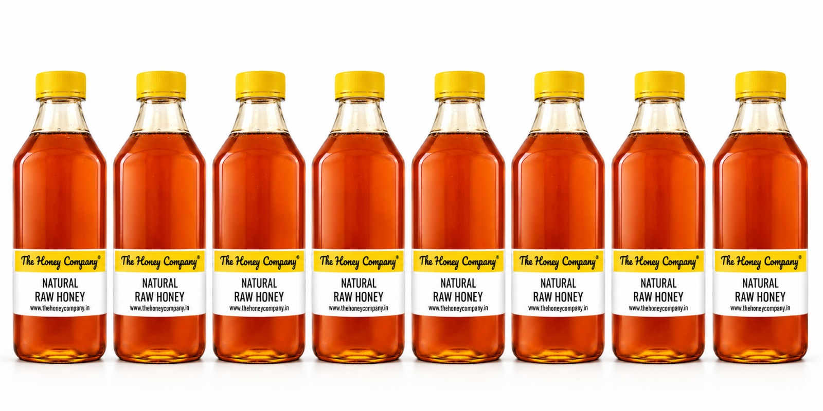 Natural Raw Honey 1.45 kg Bottle Lineup for Caterers - The Honey Company